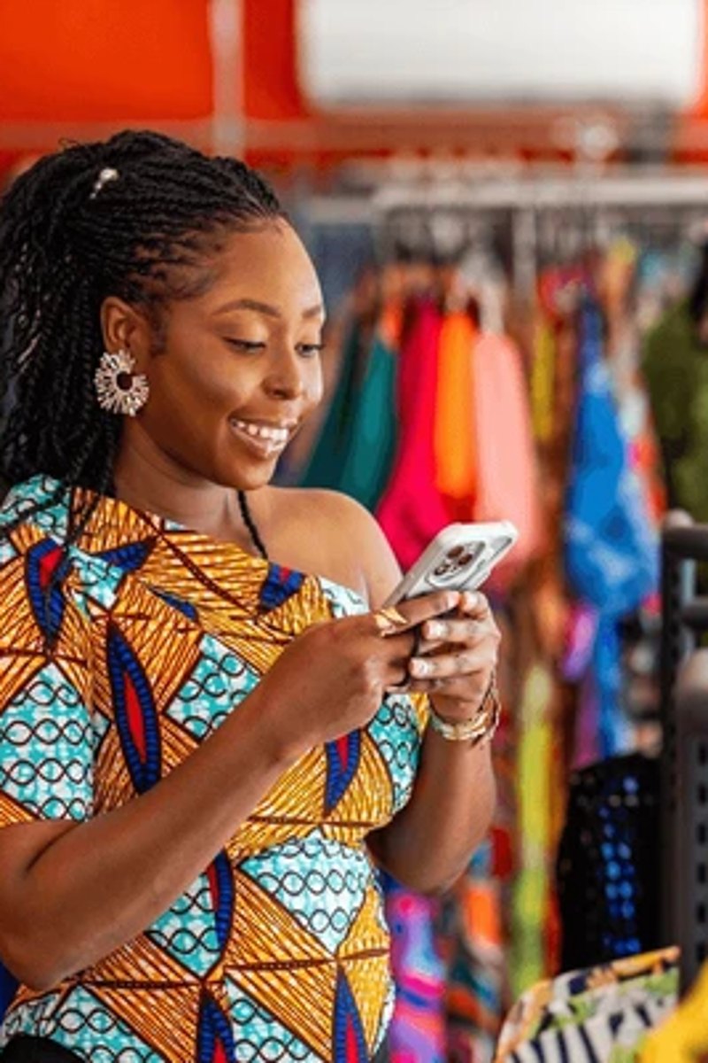Fabric seller managing her shop