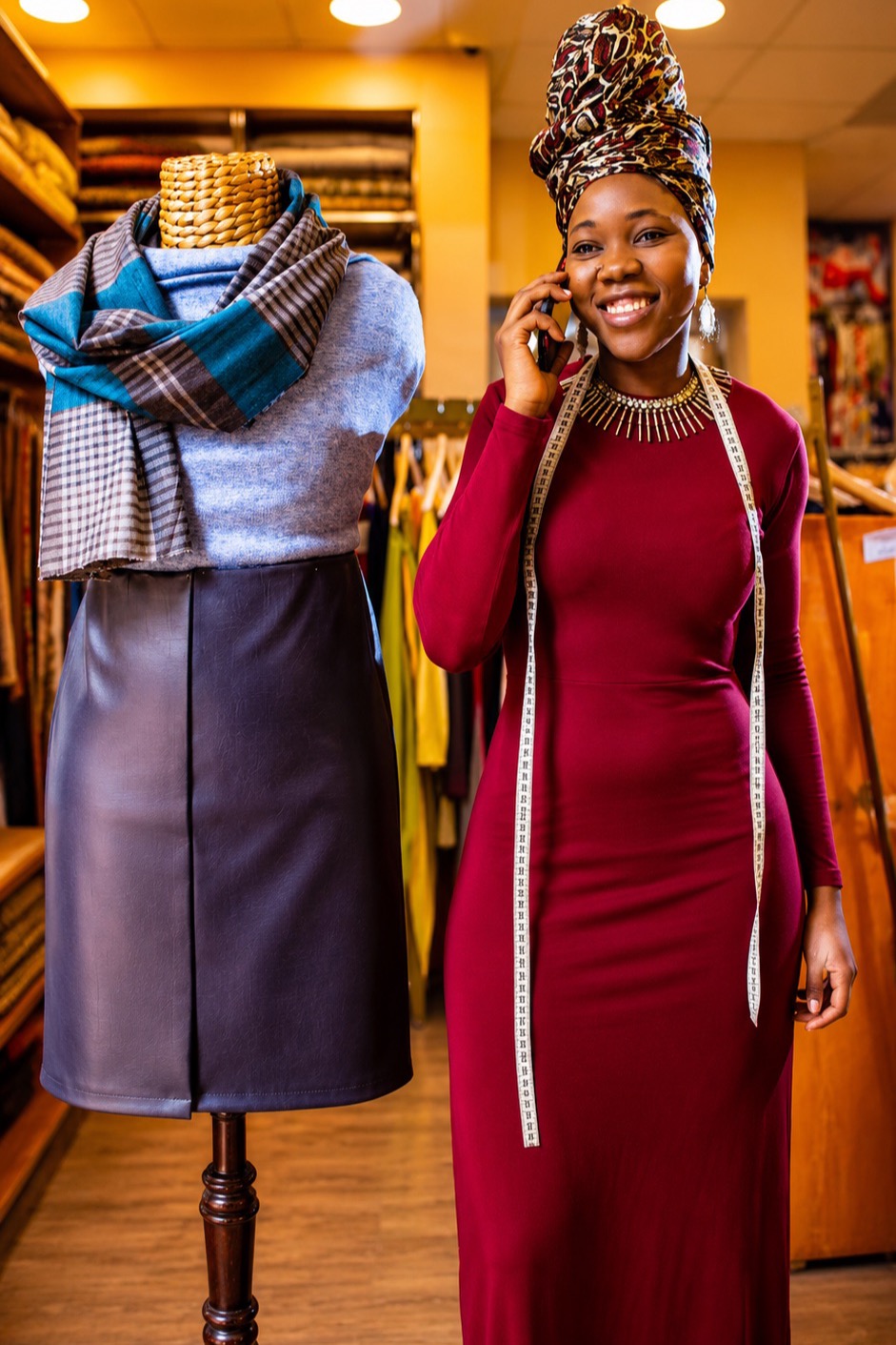 Tailor managing her studio