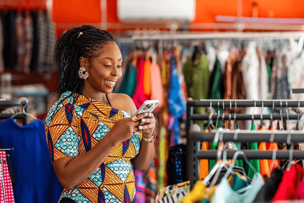 Fabric seller in her successful fashion marketplace shop